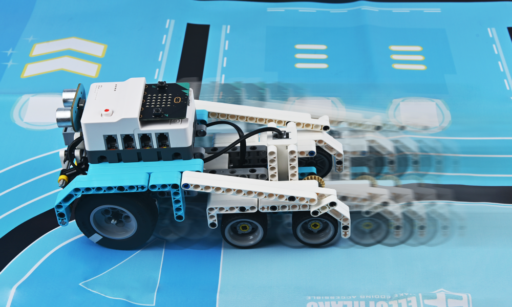 Steam Robotics Kit 110 smart racing car built with programmable blocks driving fast on a blue track
