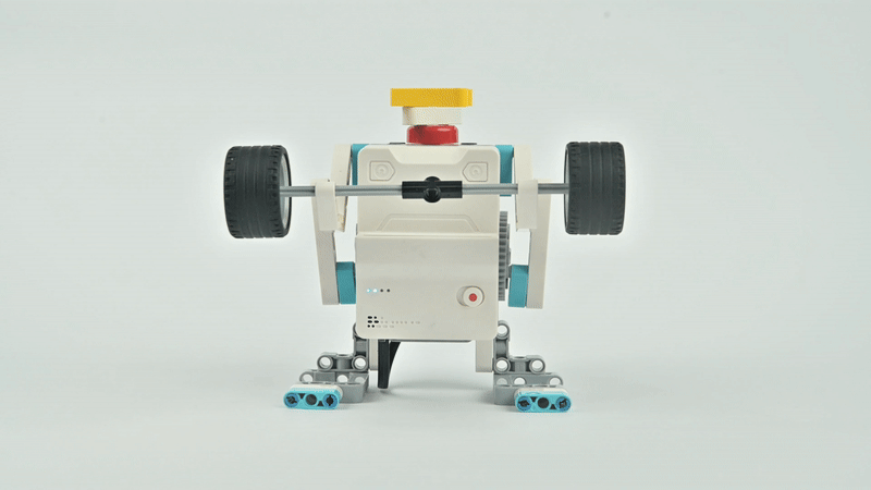 DIY robot kit example project showing a sports-themed weightlifting robot lifting a barbell, designed for STEM learning and robotics challenges