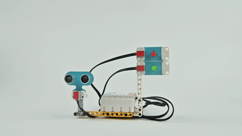 ELECFREAKS micro:bit STEM robotics kit project with ultrasonic sensor and LED traffic light modules controlled by Wukong expansion board