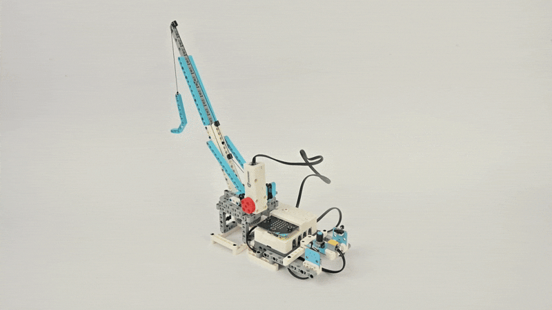 Animated crane robot built with Steam Robotics Kit 110, demonstrating programmable motor and lifting arm in motion
