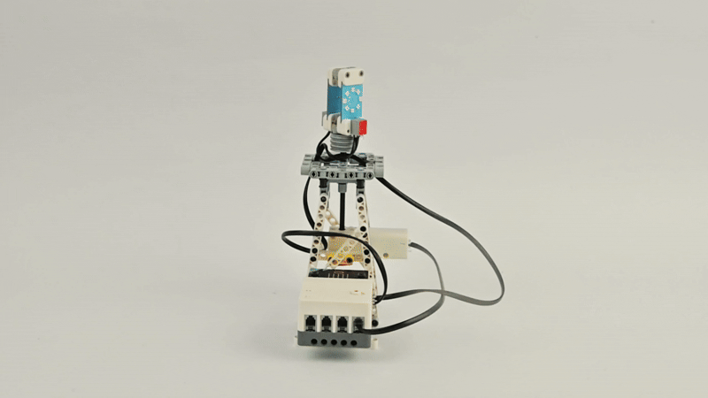 Steam Robotics Kit 110 project demonstrating a programmable water level sensor with connected controller in motion