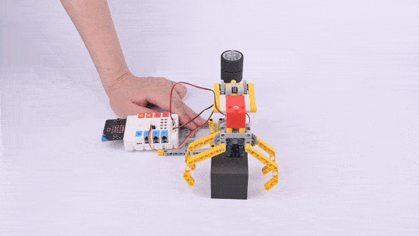 Nezha coding robotic kit robotic claw model built with LEGO compatible parts and controller module