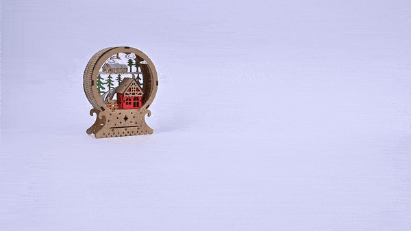 Nezha coding robotic kit robot car built with LEGO compatible parts driving forward and avoiding a wooden house obstacle