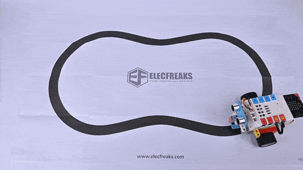 Nezha coding robotic kit robot car built with LEGO compatible parts performing line following on a track